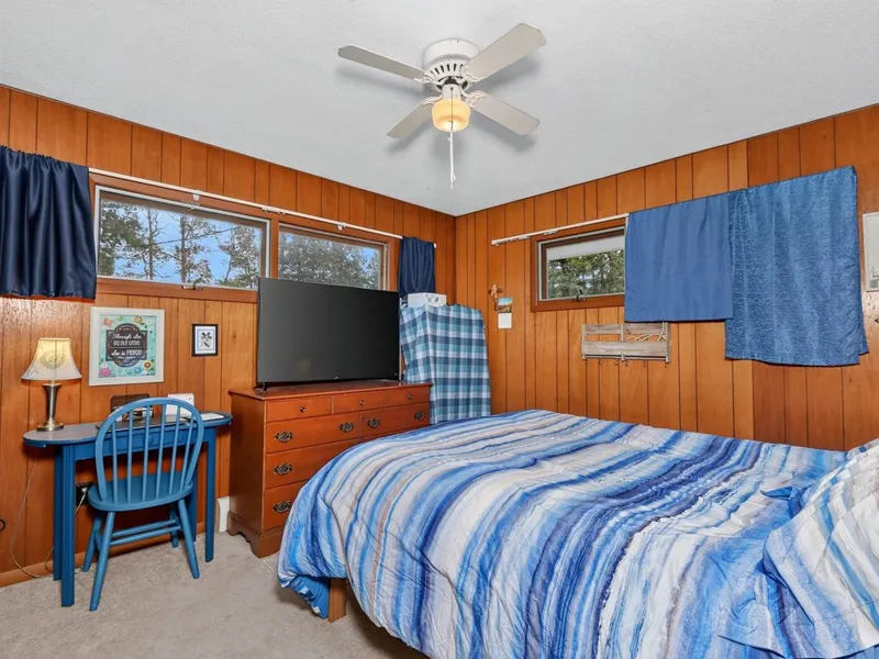 Hallway with wood doors and paneling