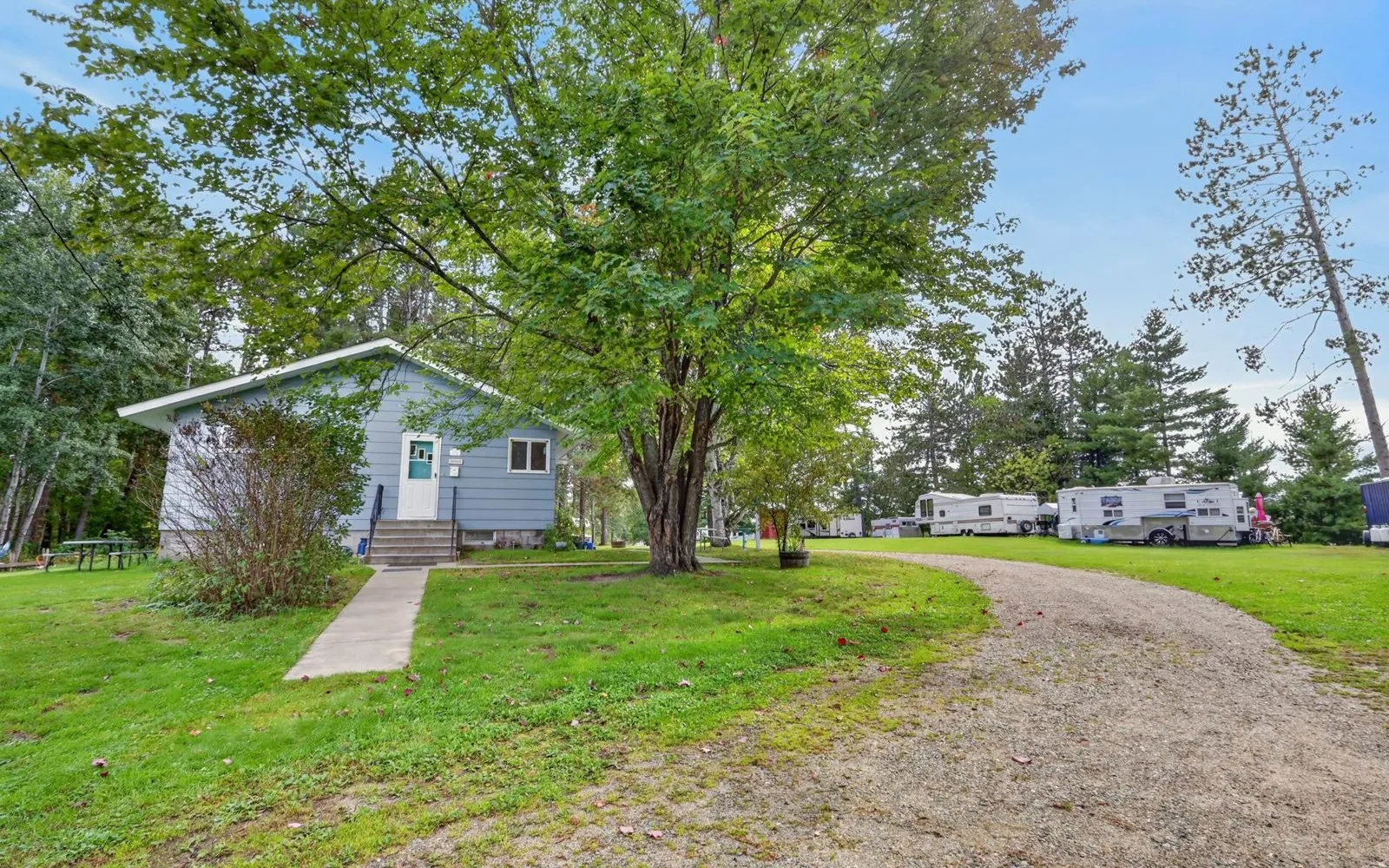 House exterior with Shallow Lake behind it