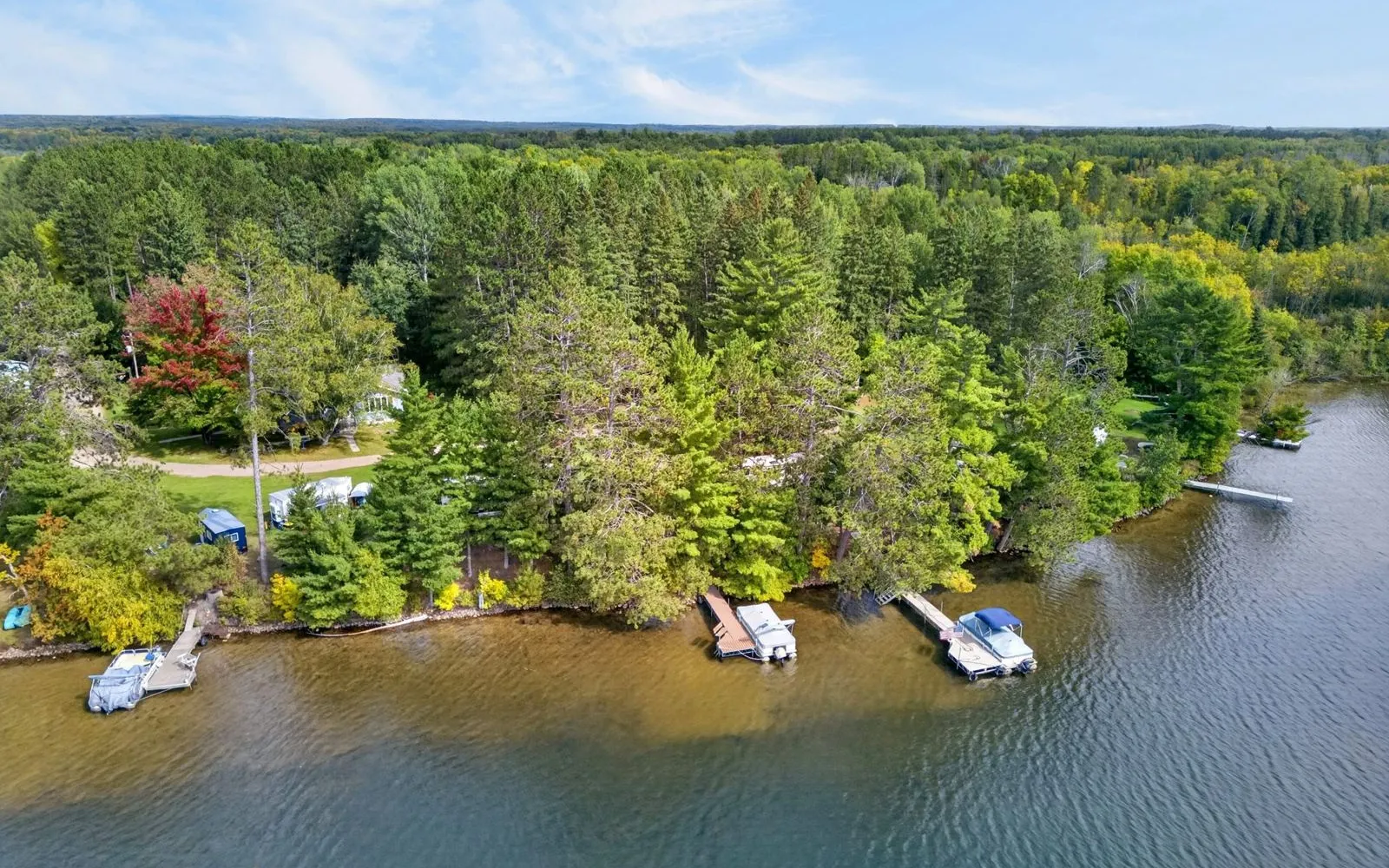 Aerial view of the shoreline, grounds, and Shallow Lake