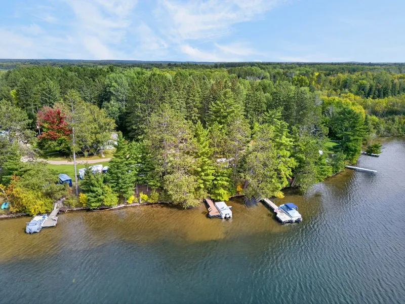 Aerial view of the shoreline, grounds, and Shallow Lake
