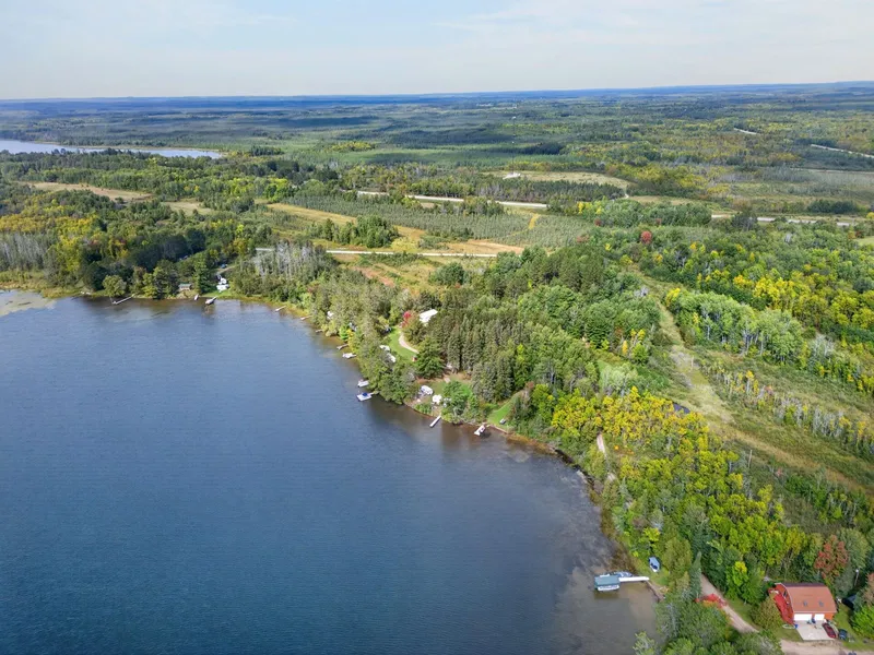 Aerial view of the property and the water