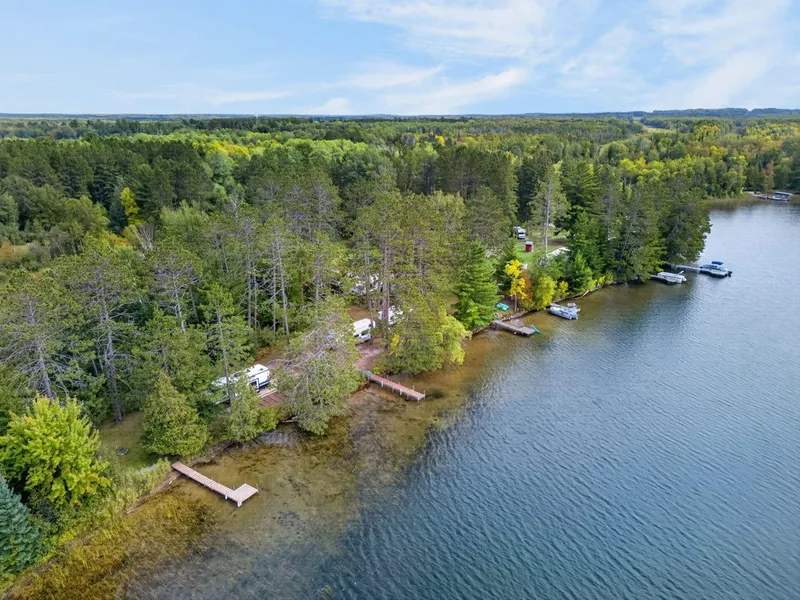 Aerial view of the property from above the lake