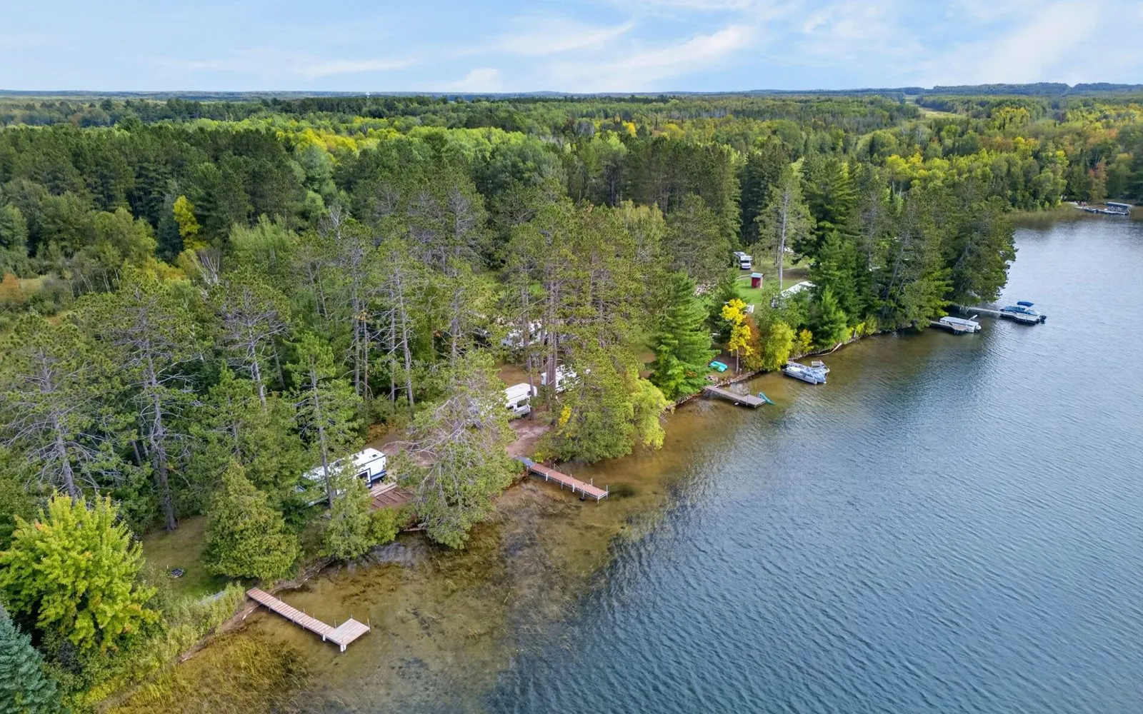 Aerial view of the property from above the lake